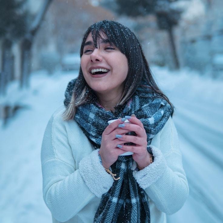 Kaveri Mehta, Lead Design Curator at Paper Grove Field, reviewing corporate floral arrangements